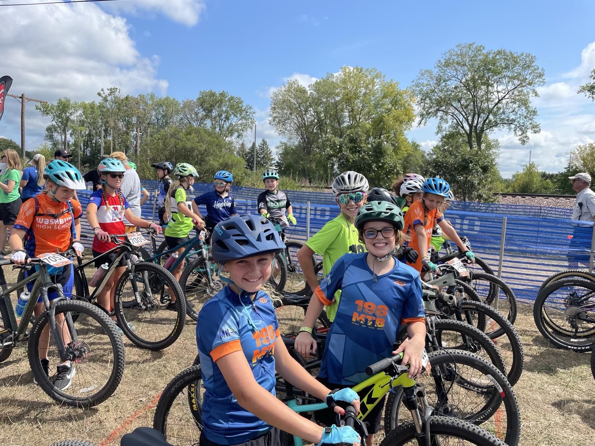 Local girls lined up at start of mountain bike race
